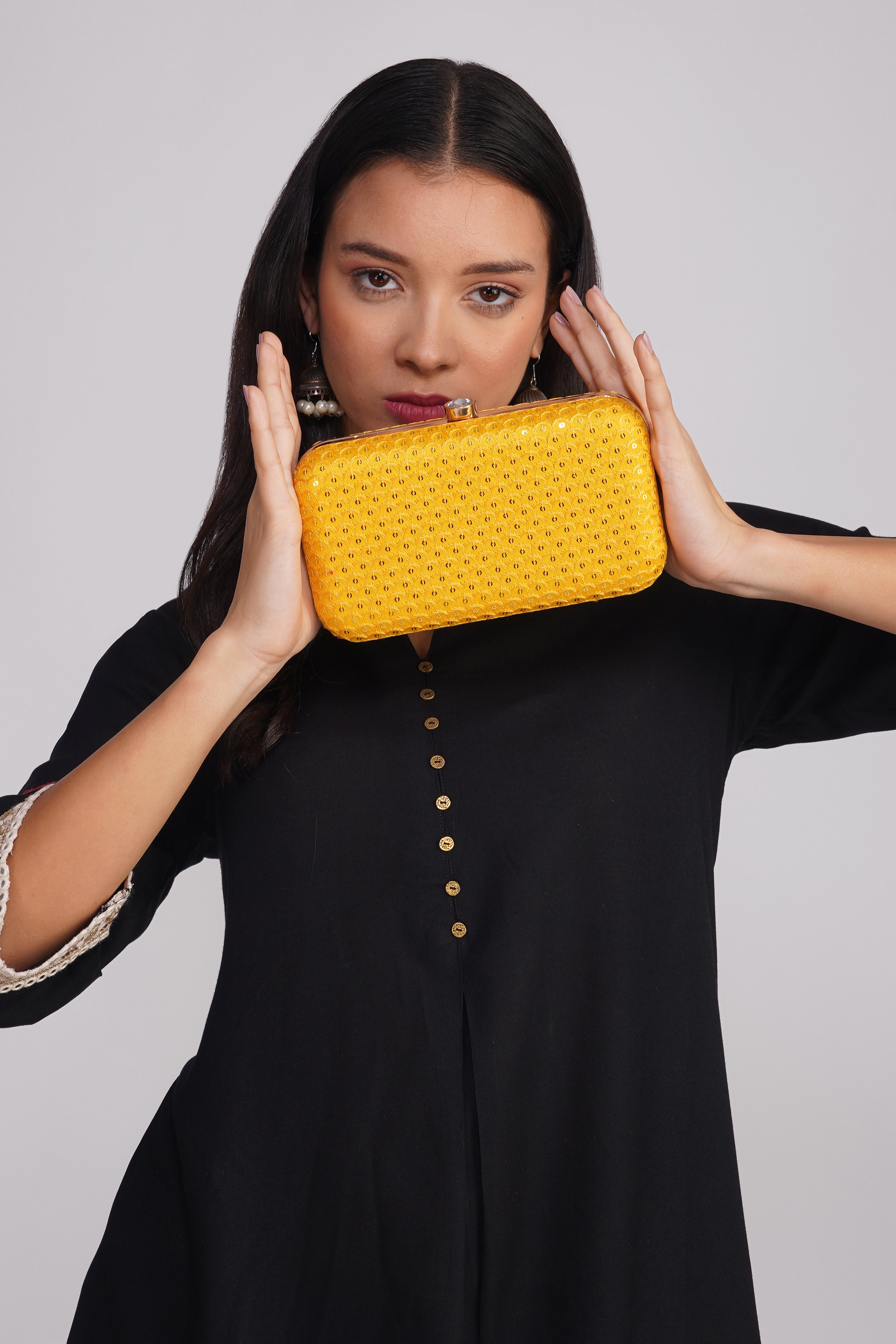 Nice-G Yellow Charm Clutch: Your Stylish Statement Piece